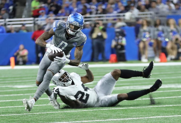 Detroit Lions wide receiver Josh Reynolds (8) catches a pass against Raiders cornerback Marcus Peters. © Kirthmon F. Dozier / USA TODAY NETWORK